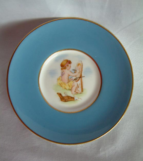 Royal Worcester cherubs cup and saucer
